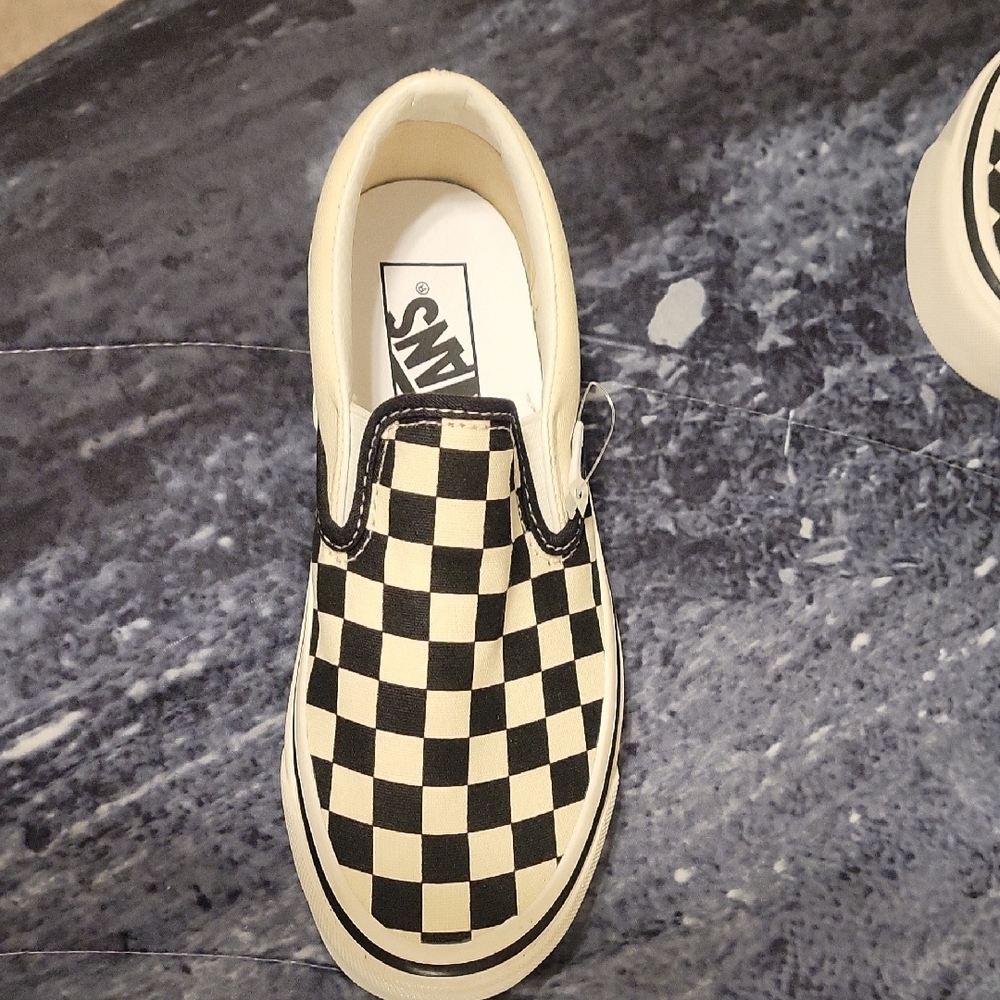 Vans Black and White Checkerboard Slip-Ons